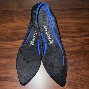 Rothy's Elegant Black Flats with Blue Trim